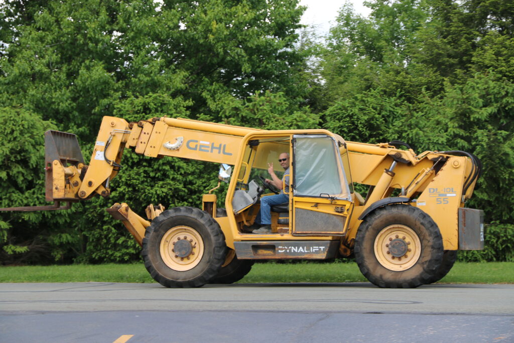 Mike Watkins operating a large construction vehicle